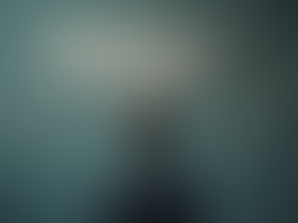 Eye-level view of a person looking thoughtfully at a complex puzzle