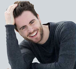 A man happy with his hair transplant