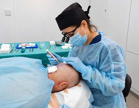 Dr Feyroza doing extraction with wireless handpeace