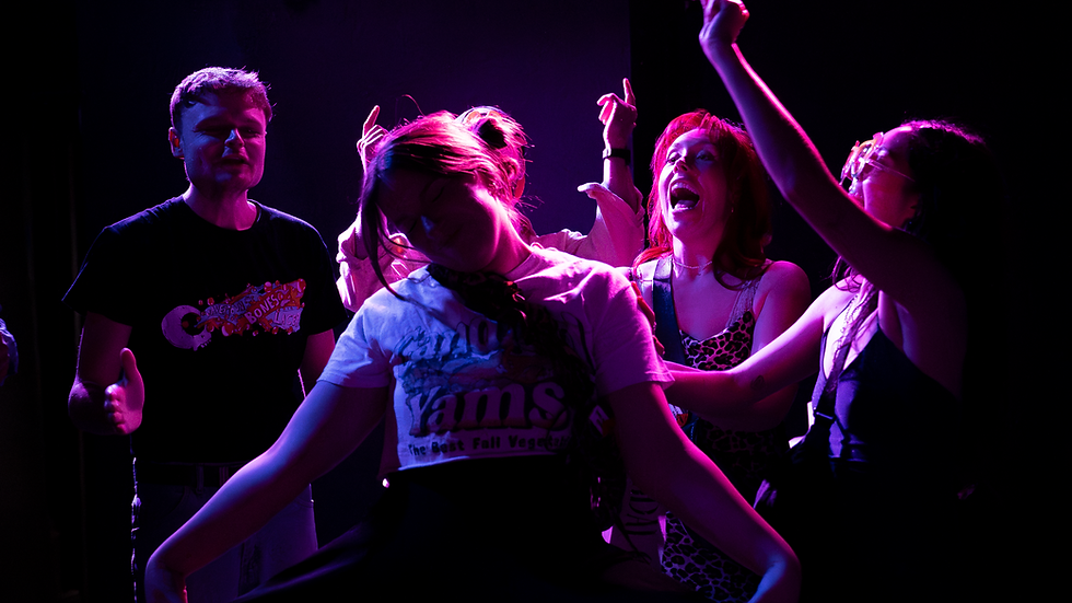Production photo of characters in club