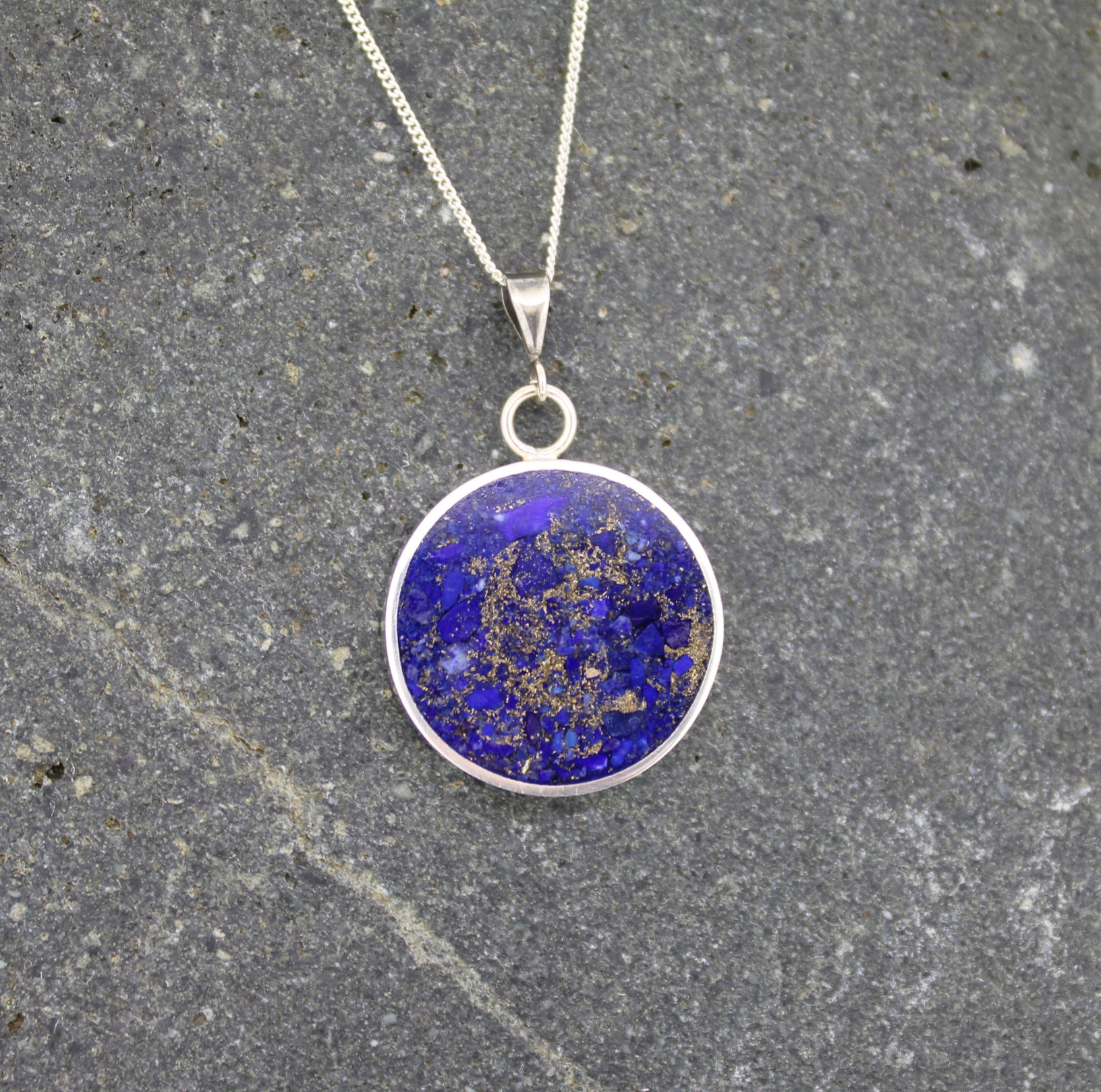 Silver pendant with lapis and gold flecks