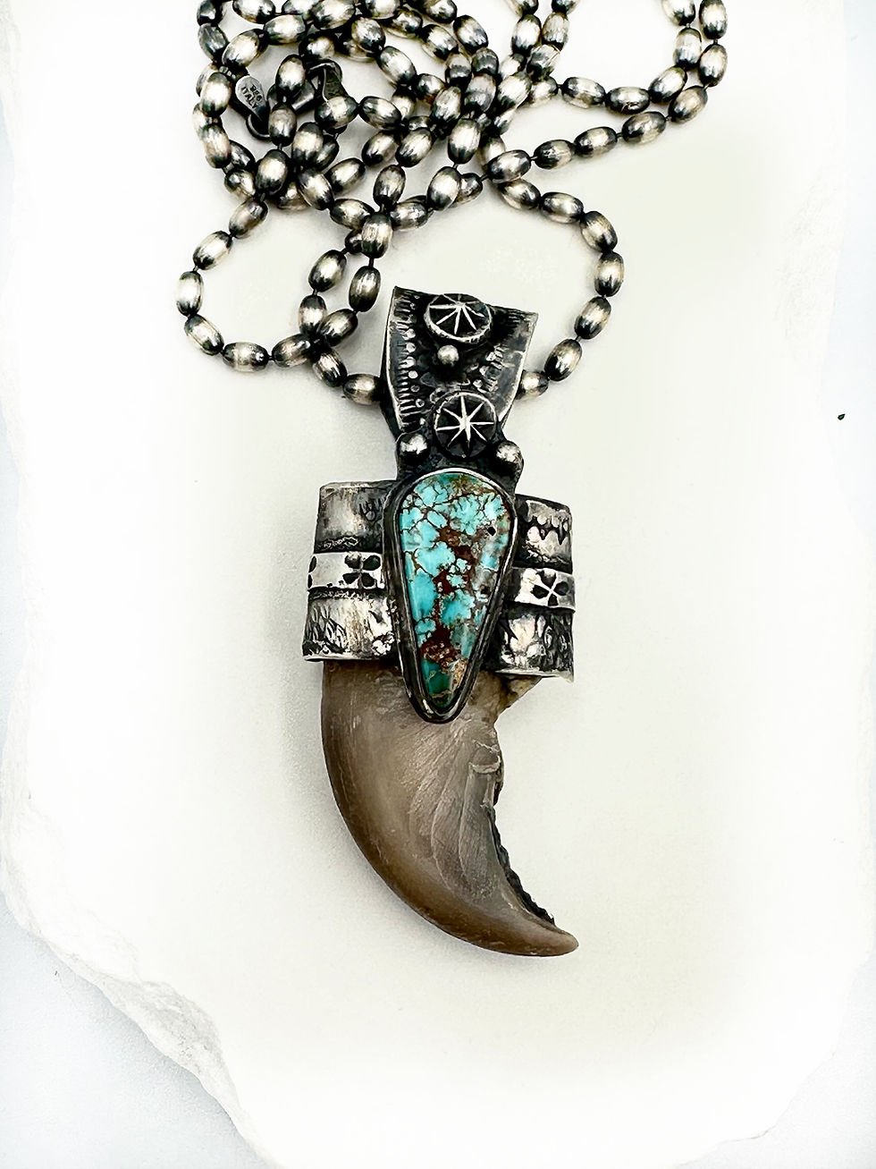 Thumbnail: No. 50 ❅ Bear Claw Talisman
