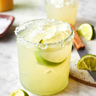 Refreshing pinapple margarita cocktail, salt rim