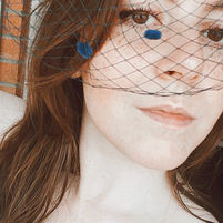 Bailey Colors wearing veil