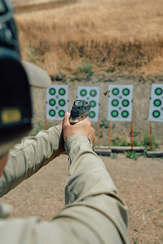 Man loading pistol