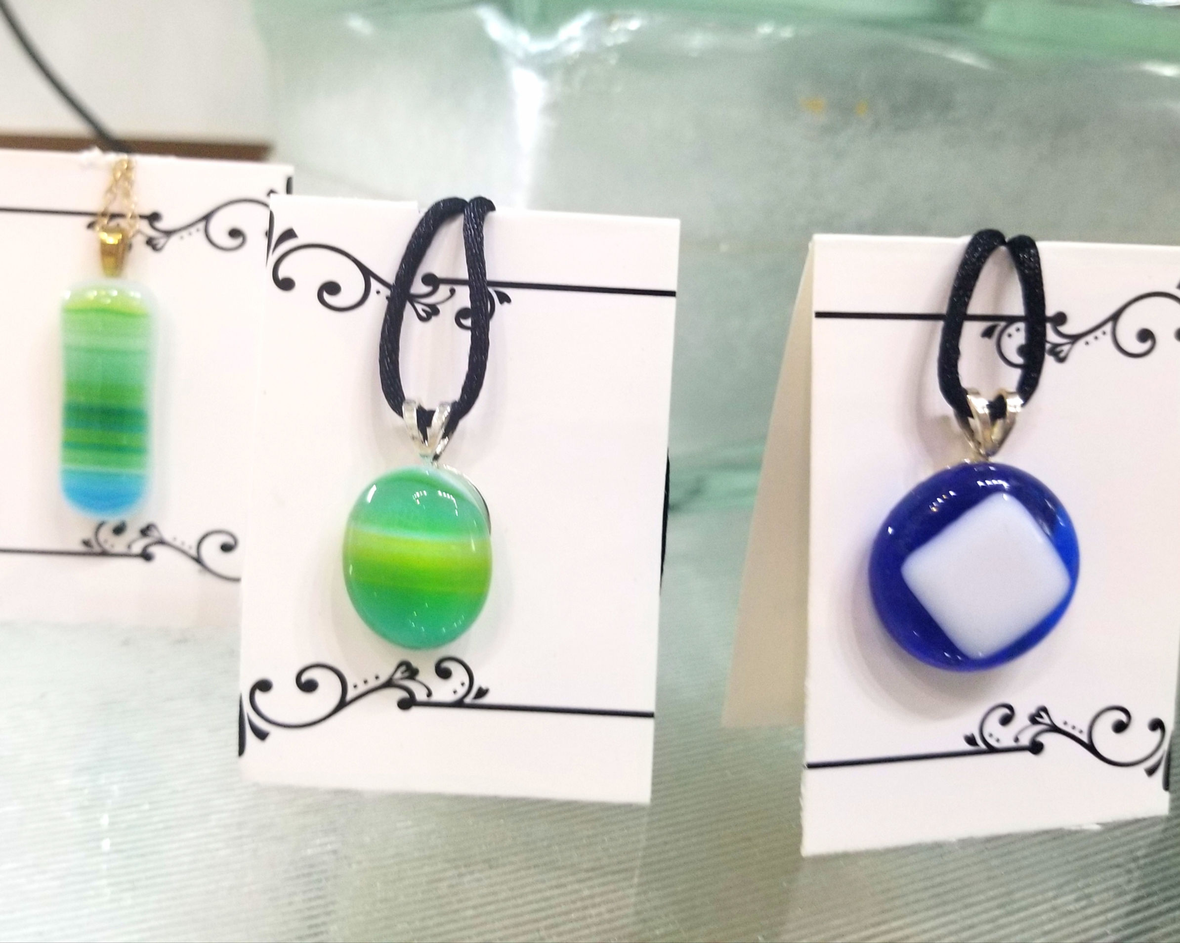 Hand cut kiln fused glass pendant necklace.  