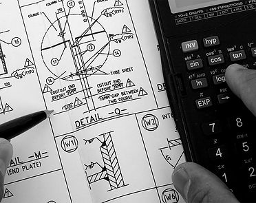 side med tal og mekaniske tegninger