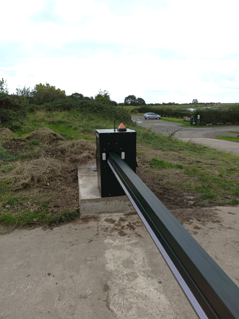 Black automated traffic barrier