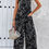 Thumbnail: Geo Print Smocked Sleeveless Pockets Jumpsuit
