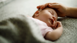 Sleeping newborn baby.