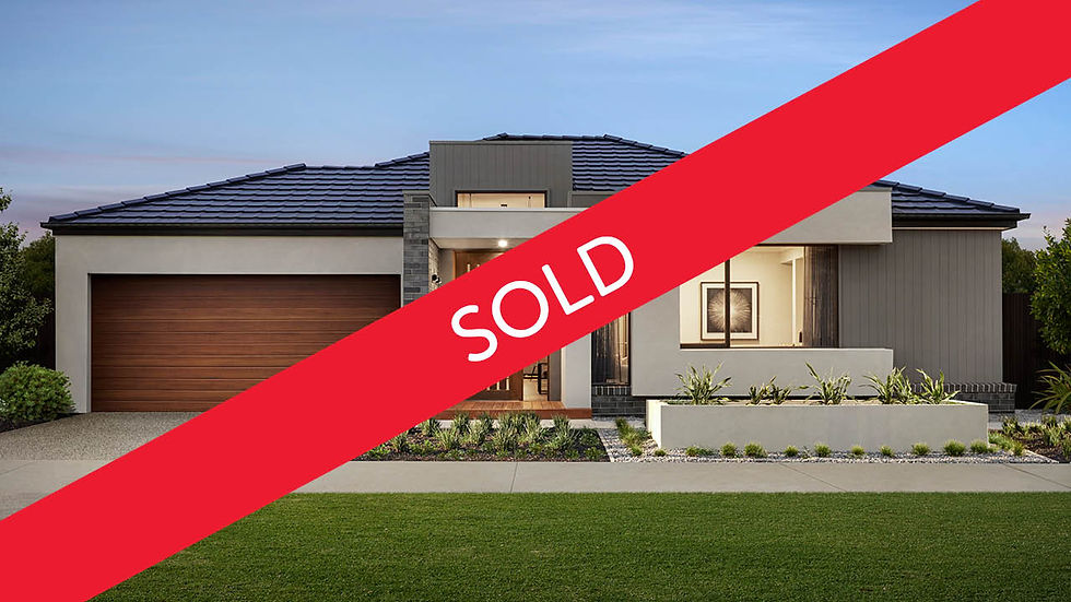 Recently Sold house with sold banner across the front.