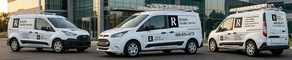 Three white service vans with "Reliable Facility Service" branding and contact details are parked outside a modern glass building at sunset.