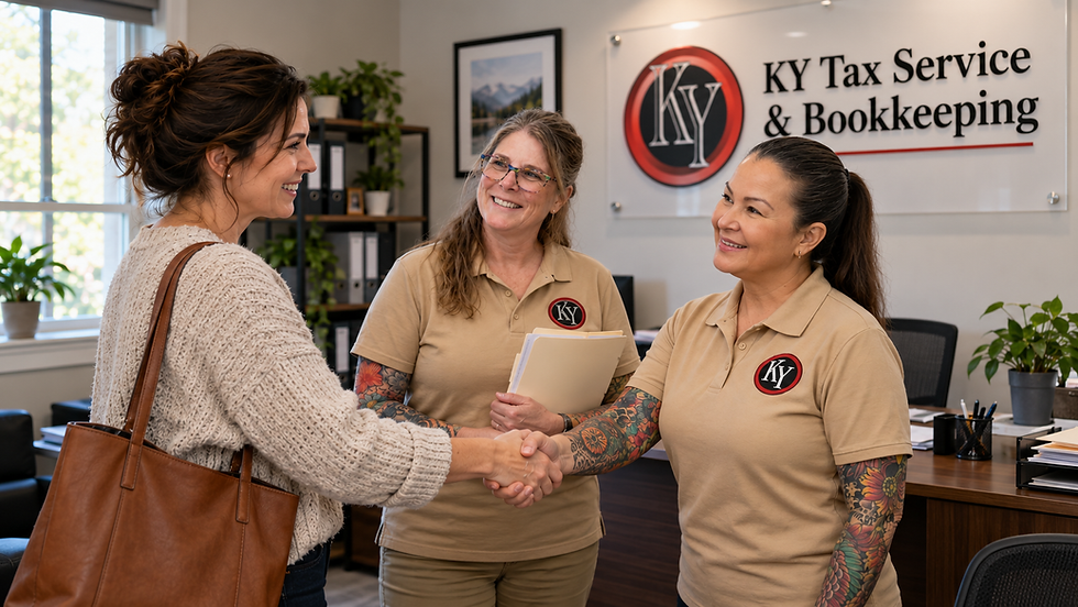 Self-employed business owner shaking hands with Kim at KY Tax Service & Bookkeeping after a productive meeting, with Jill standing beside them holding client paperwork in the office.