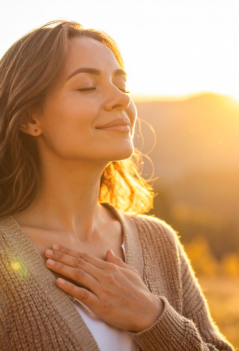 Firefly_A close-up of a person standing in sunlight, eyes closed, with a hand over their h