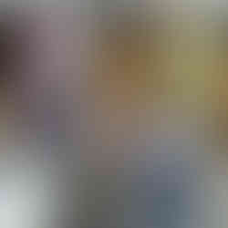 Dr. Saini, Vimal, and a staff member smile for the camera.