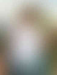 This boy is happy to show his colorful globe.