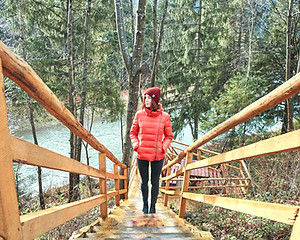 Girl Walking Up Wooden Stairs