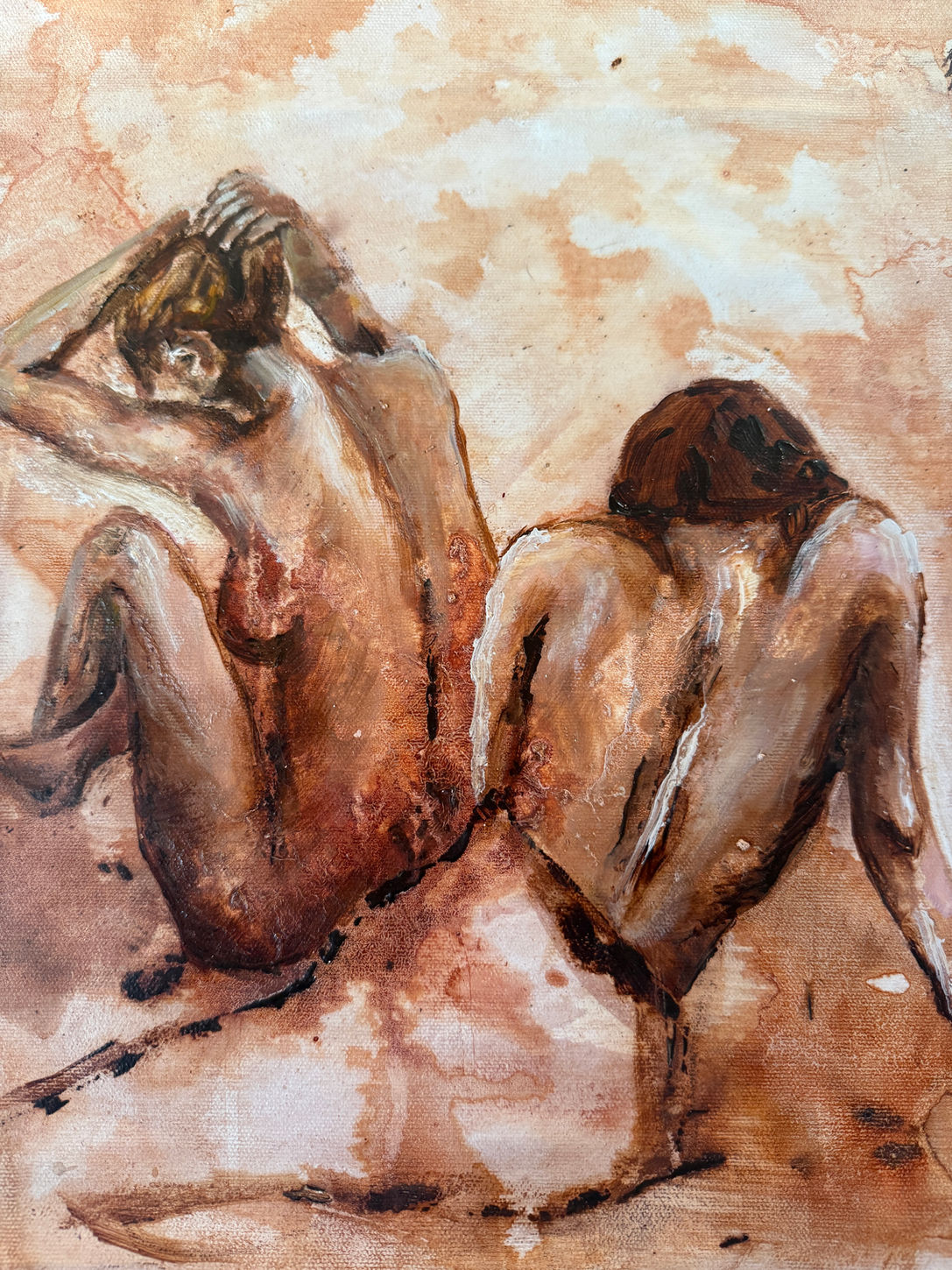 Two women painted in warm earth tones