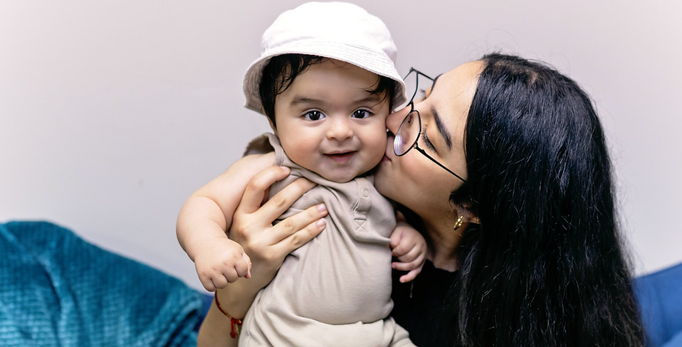 Mom Kissing Baby