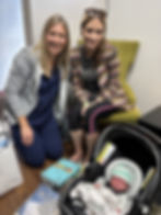 mother holding newborn child