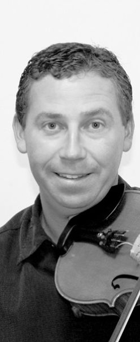 Rodney Krip, one of the members of the fiddle/piano trio "The Cleavers".