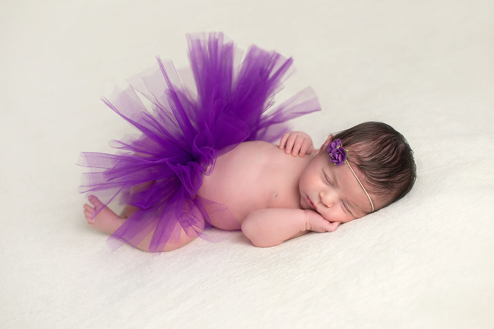 Newborn-Baby-Wearing-a-Purple-Tutu-917059328_2126x1415.jpeg