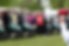 Person with megaphone at Spring Scramble golf event