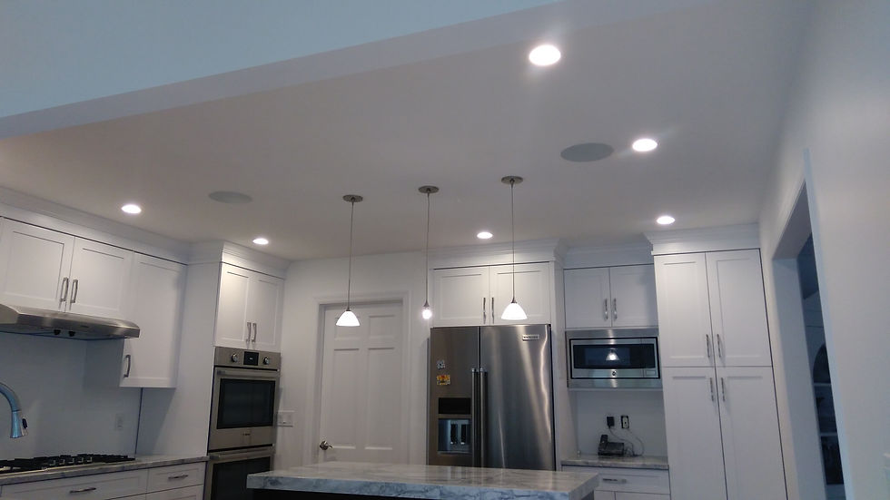 Modern white kitchen with island, stainless steel appliances