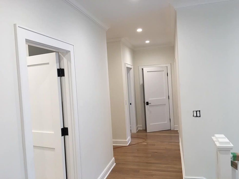 Clean, newly painted hallway by a painting contractor