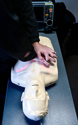 CPR manekin being utilized for training