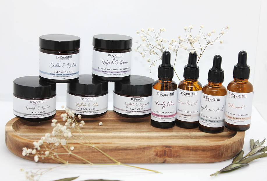Natural skincare flat lay featuring Berootiful product collection with botanical elements and neutral-toned background