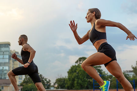 side-view-woman-man-running-track_edited.jpg