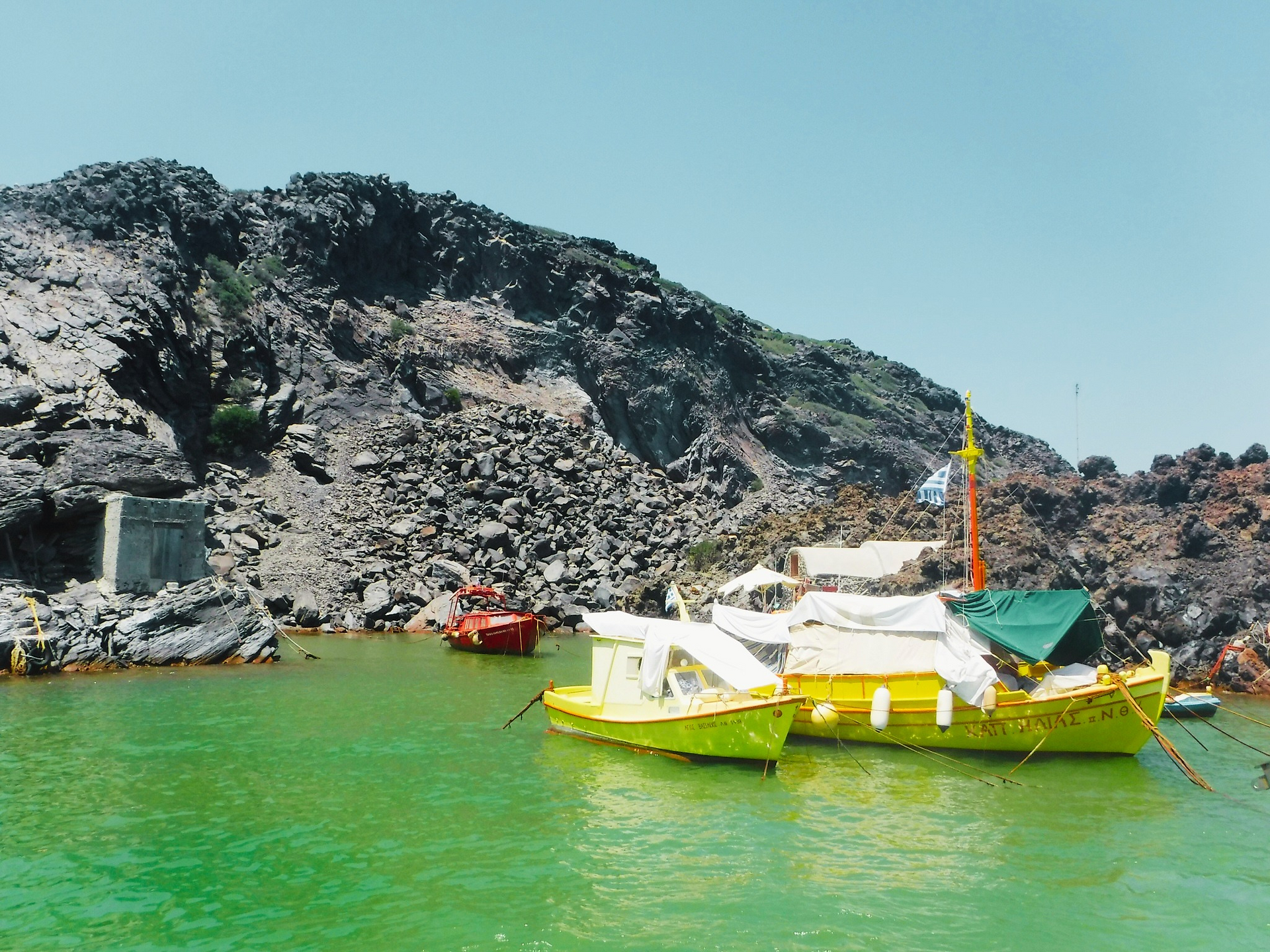 Greece, Santorini, Oia, caldera, Aegean Sea, white cliff side, boat day, black sand beach, volcano, fishing boats, hot springs,