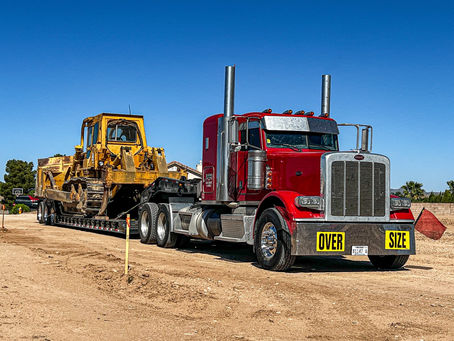 Flat Out Services Delivers Caterpillar Dozer from California to Arizona, Showcasing Quality Heavy Haul Trucking Service