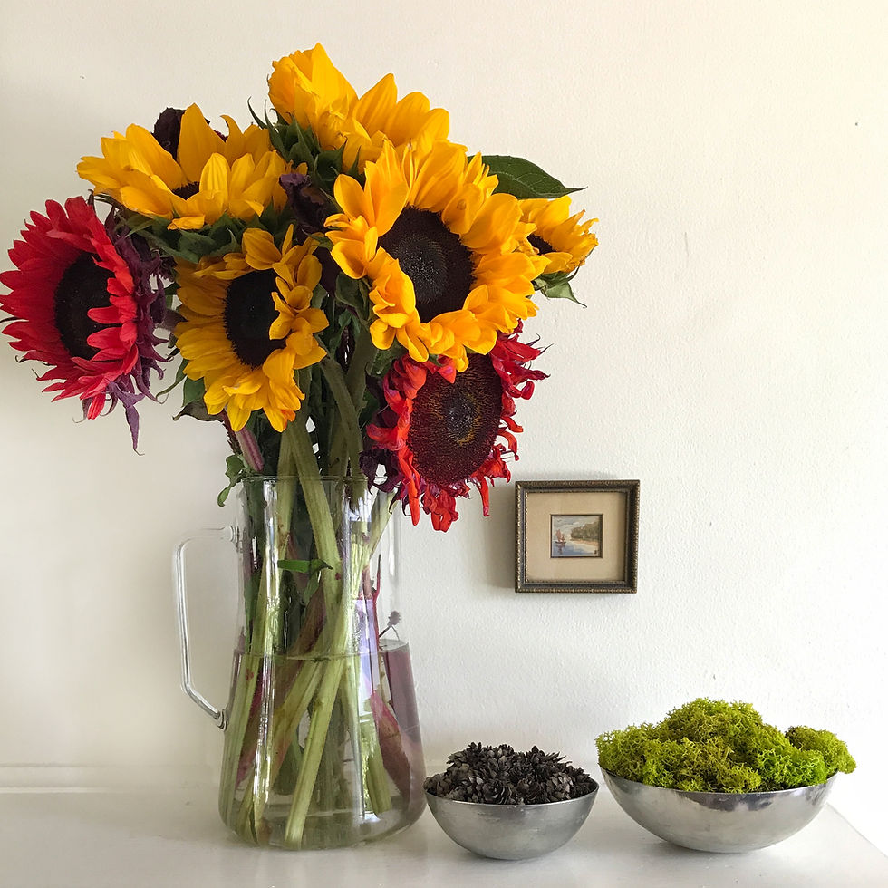 mantel decor with sunflowers, pewter bowls miniature art with white walls