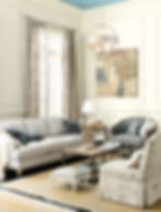 Traditional living room with blue painted ceiling seagrass rugs