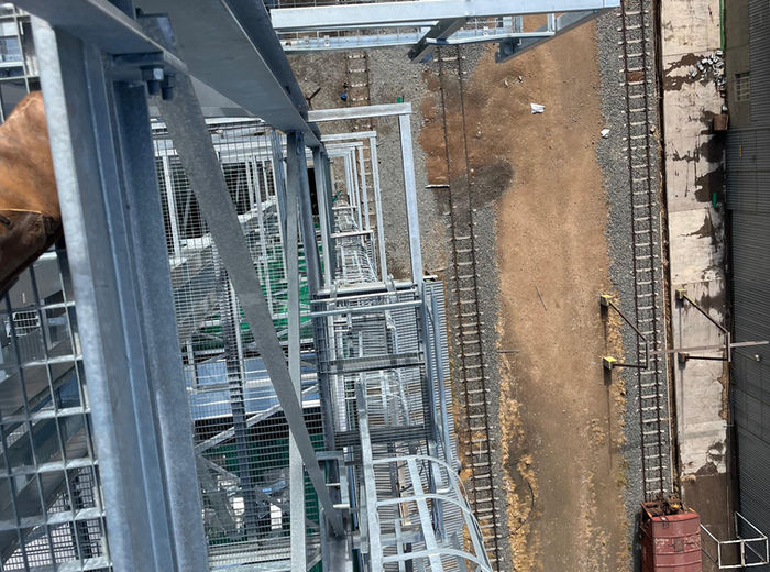 Steel walkways and handling equipment on a grain site