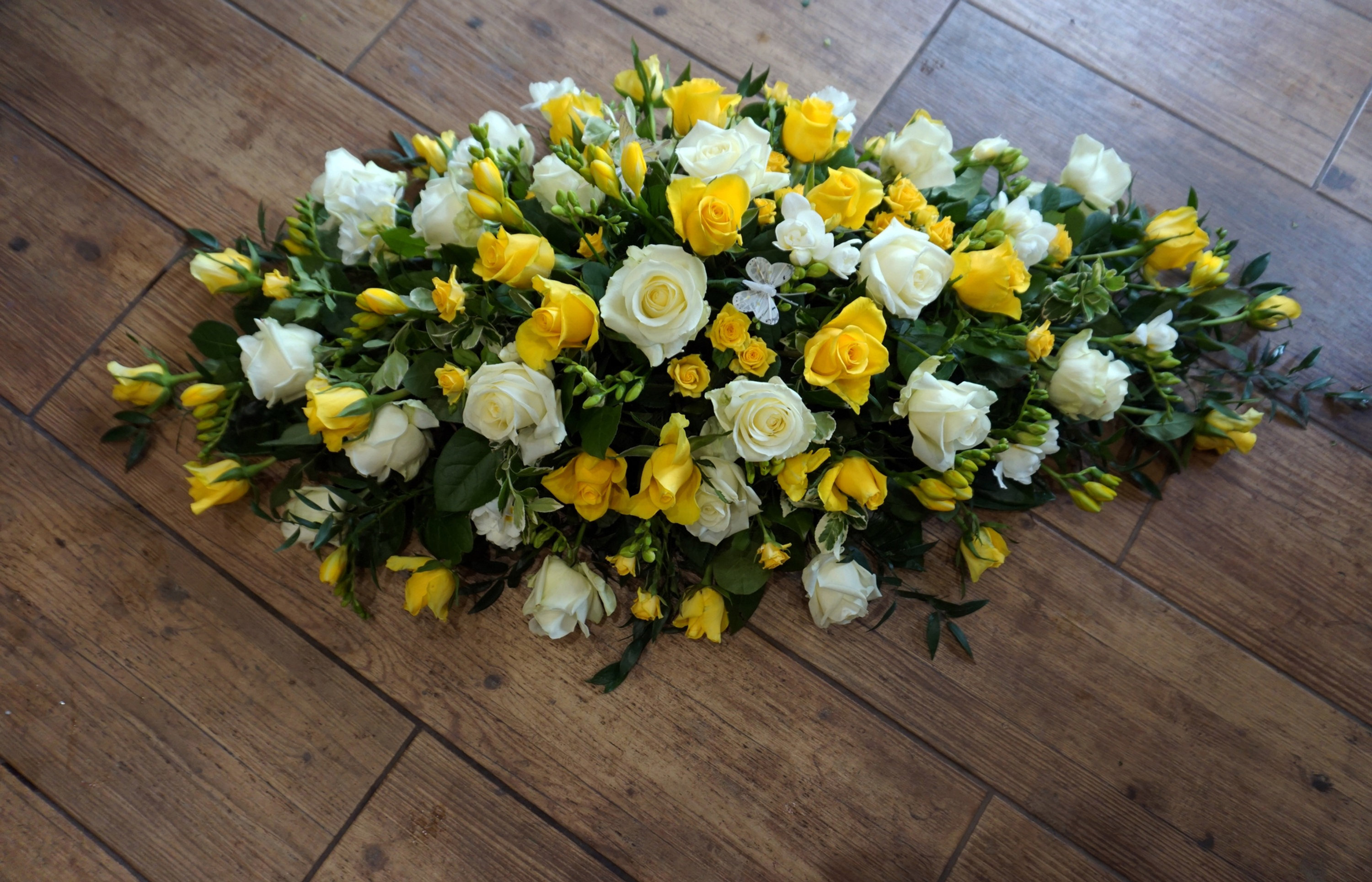 White Yellow Rose Freesia Casket Spray The Flower Company
