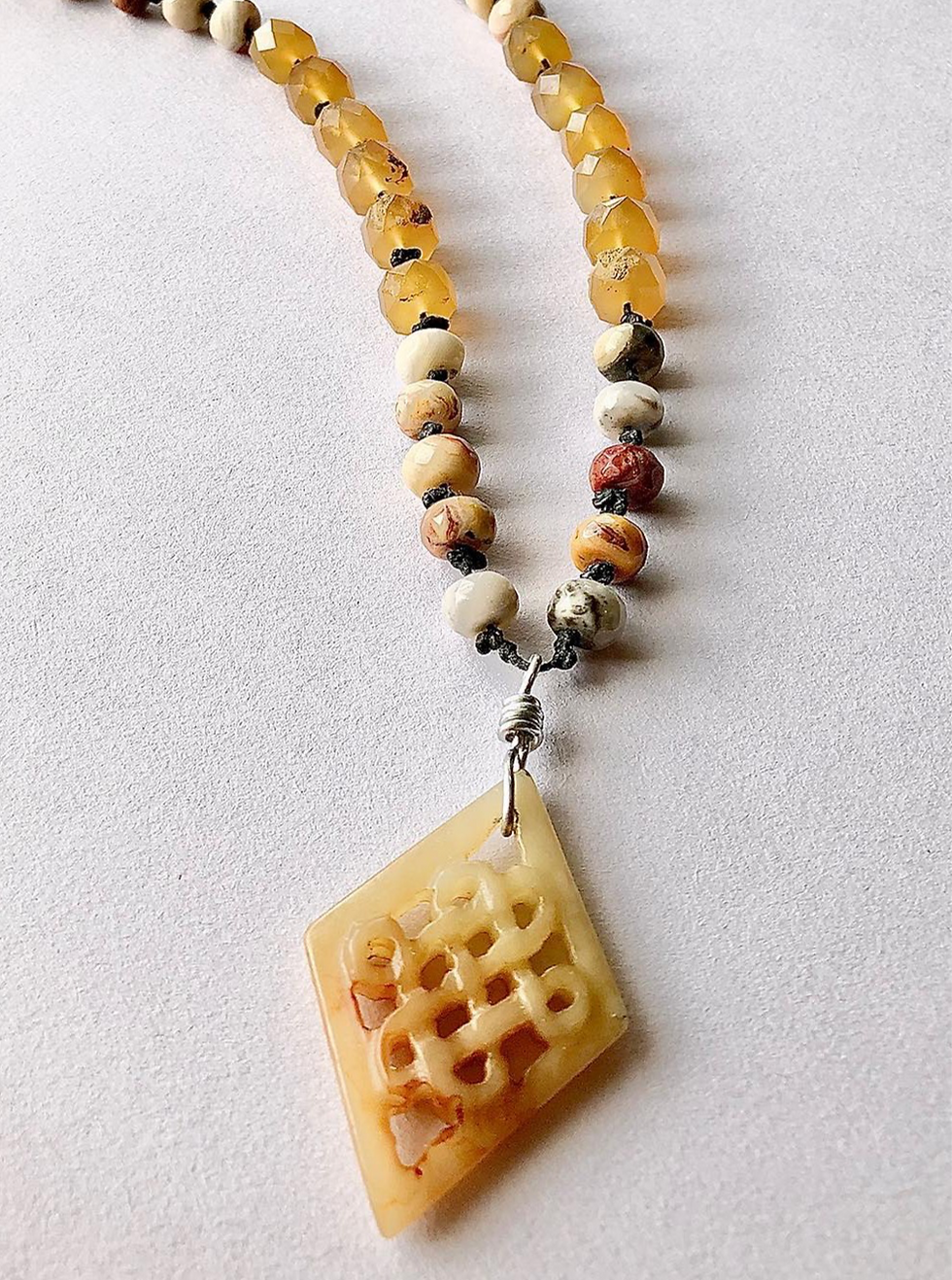 Thumbnail: Carved Orange Jade Pendant Necklace