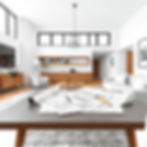 interior design with blueprints sitting on a table in a living room'.jpg