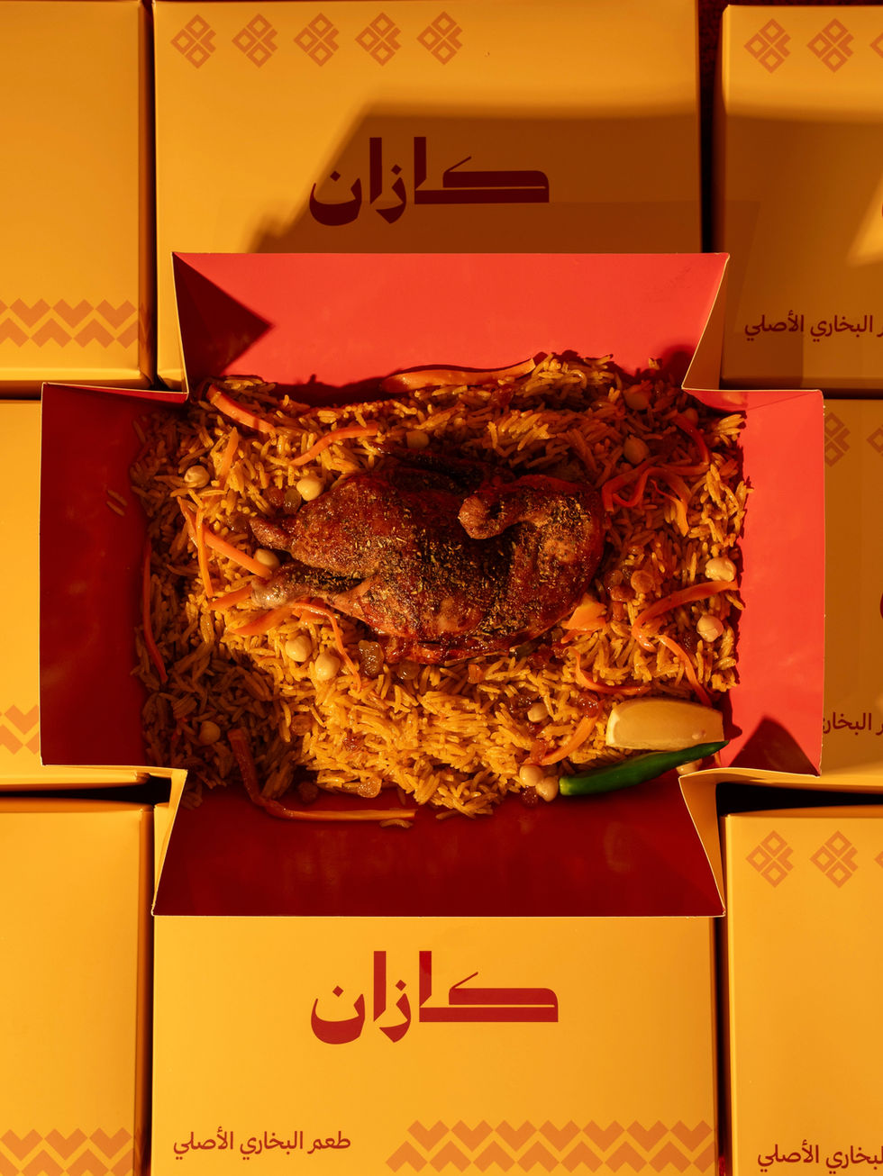 Boxes with Arabic text surrounding a central dish.