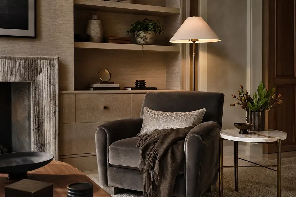 Professional interior design in DC showing coordinated furniture, layered neutrals, and expert material selection in living room