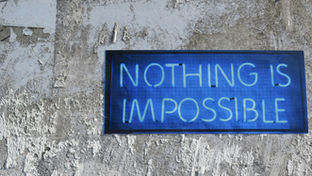 neon sign saying 'nothing is impossible'