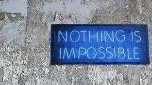 neon sign saying 'nothing is impossible'