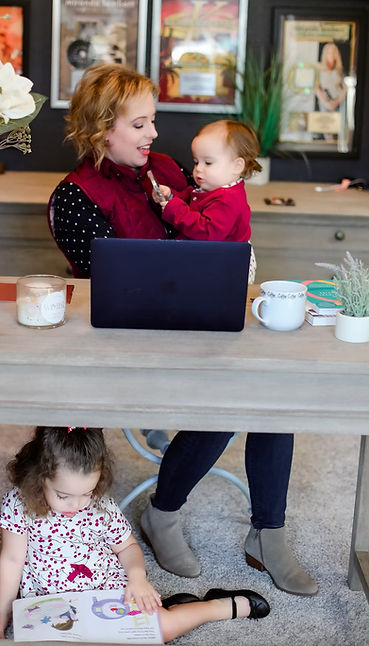 Laura Bull at Office with kids.jpeg