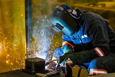male-working-with-a-welding-torch.jpg
