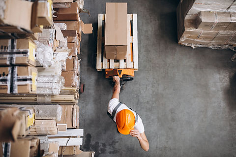 young-man-working-at-a-warehouse-with-boxes (1).jpg
