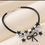 Thumbnail: Stylish and Chic Black and Silver Rhinestone Bowknot & Stars Charm Bracelet