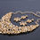 Thumbnail: Glamourous Golden Floral Necklace and Earrings Set with Champagne Rhinestone