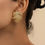 Thumbnail: Fancy French Vintage Geometric Asymmetrical Twisted Swirl Design Gold Earrings
